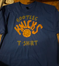 a blue t - shirt with the words brooklyn knicks on it